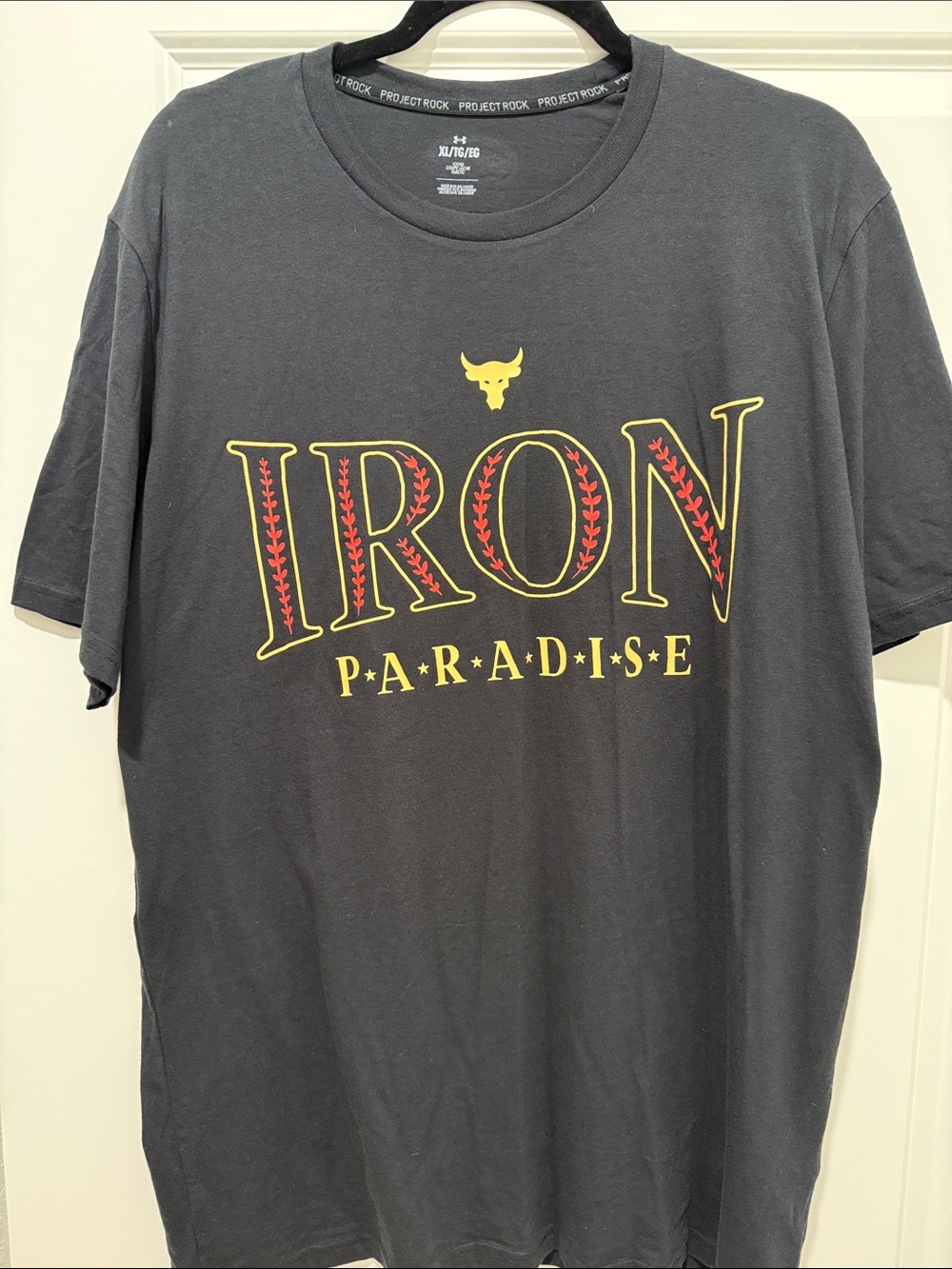 Under Armour Iron Paradise Tee in Black with Yellow & Red Graphics